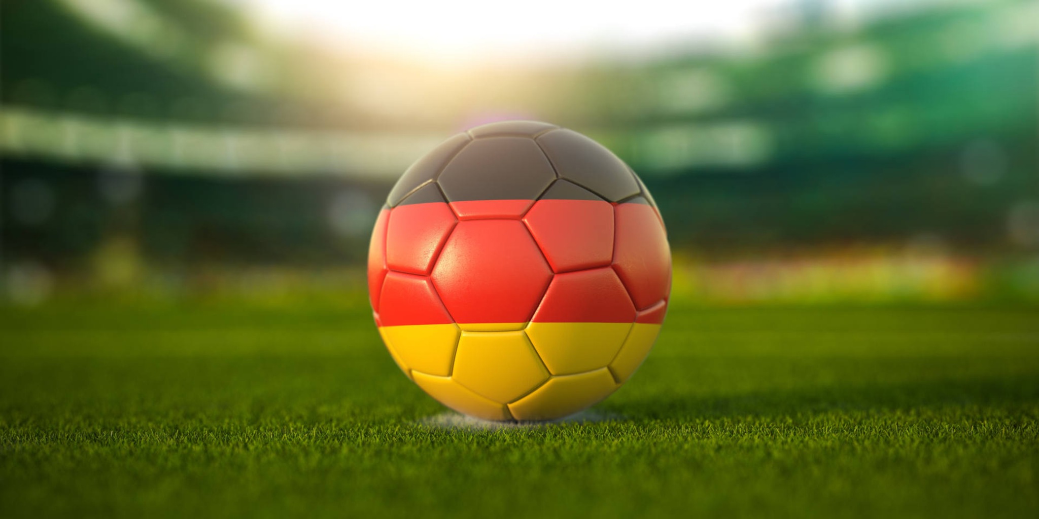 Viaggiare in Germania: foto di pallone da calcio con colori della bandiera tedesca